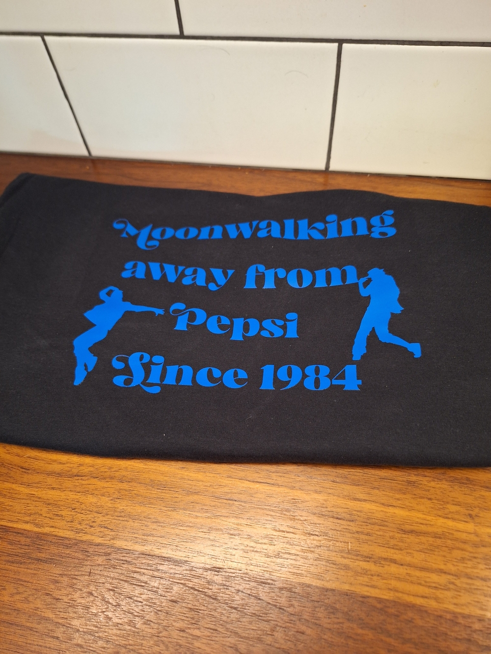 Black Tee with Blue Michael Jackson 'Moonwalking away from Pepsi' Graphic